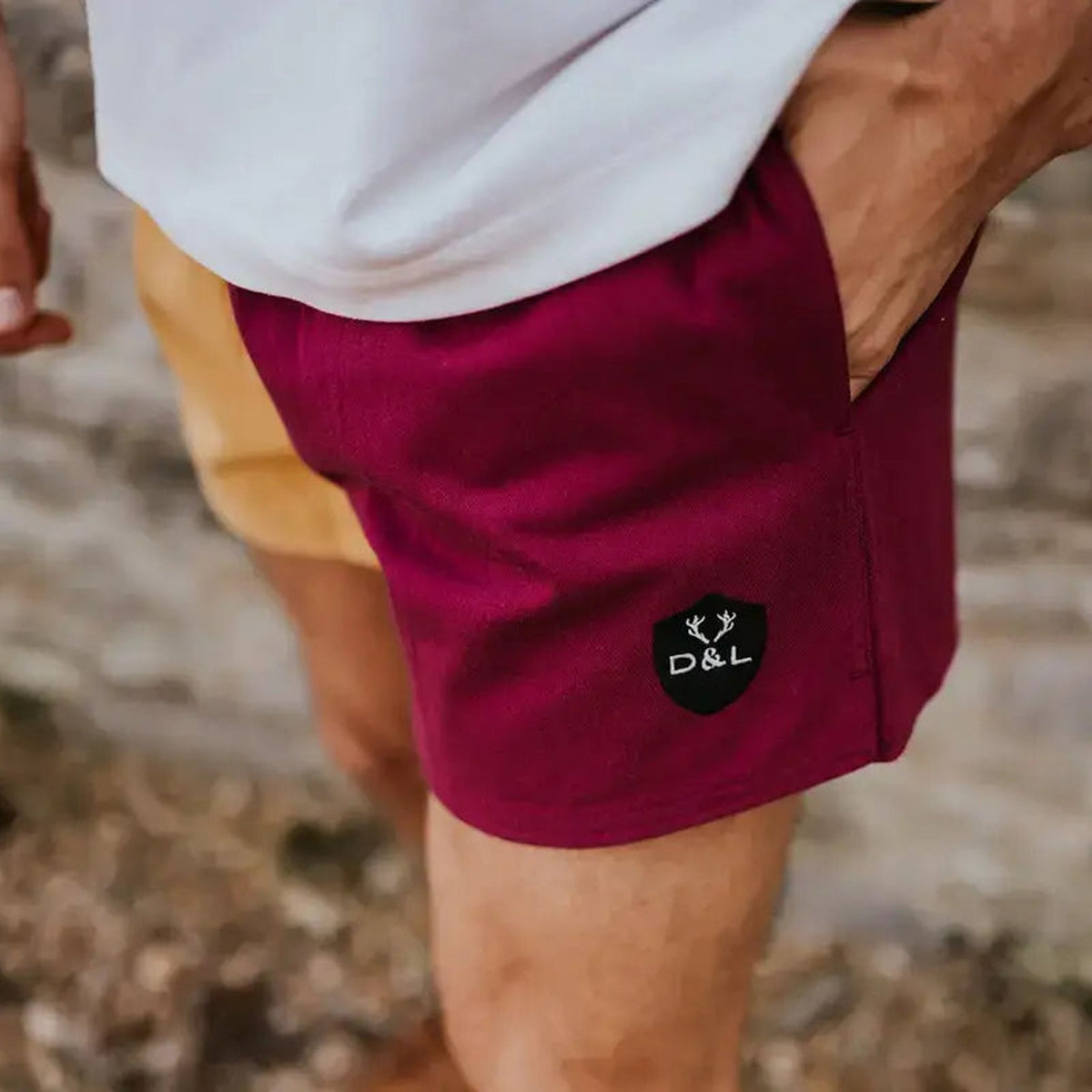Digby & Litten Maroon & Gold Rugby Shorts — close-up detail.