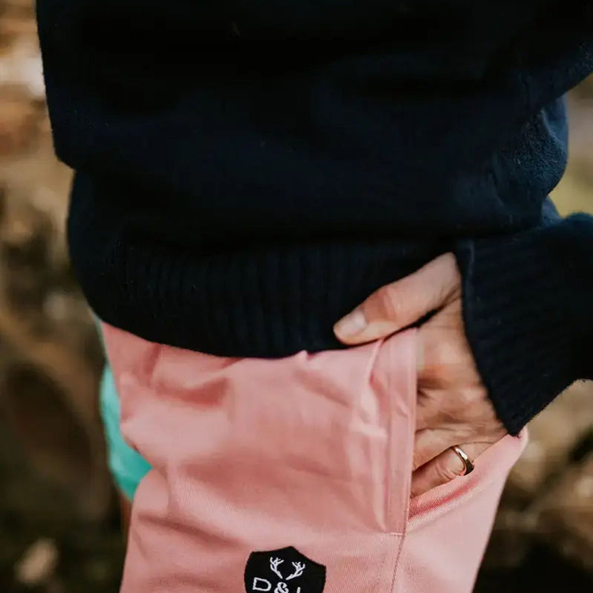 Digby & Litten Coral & Turquoise Rugby Shorts — close-up detail.