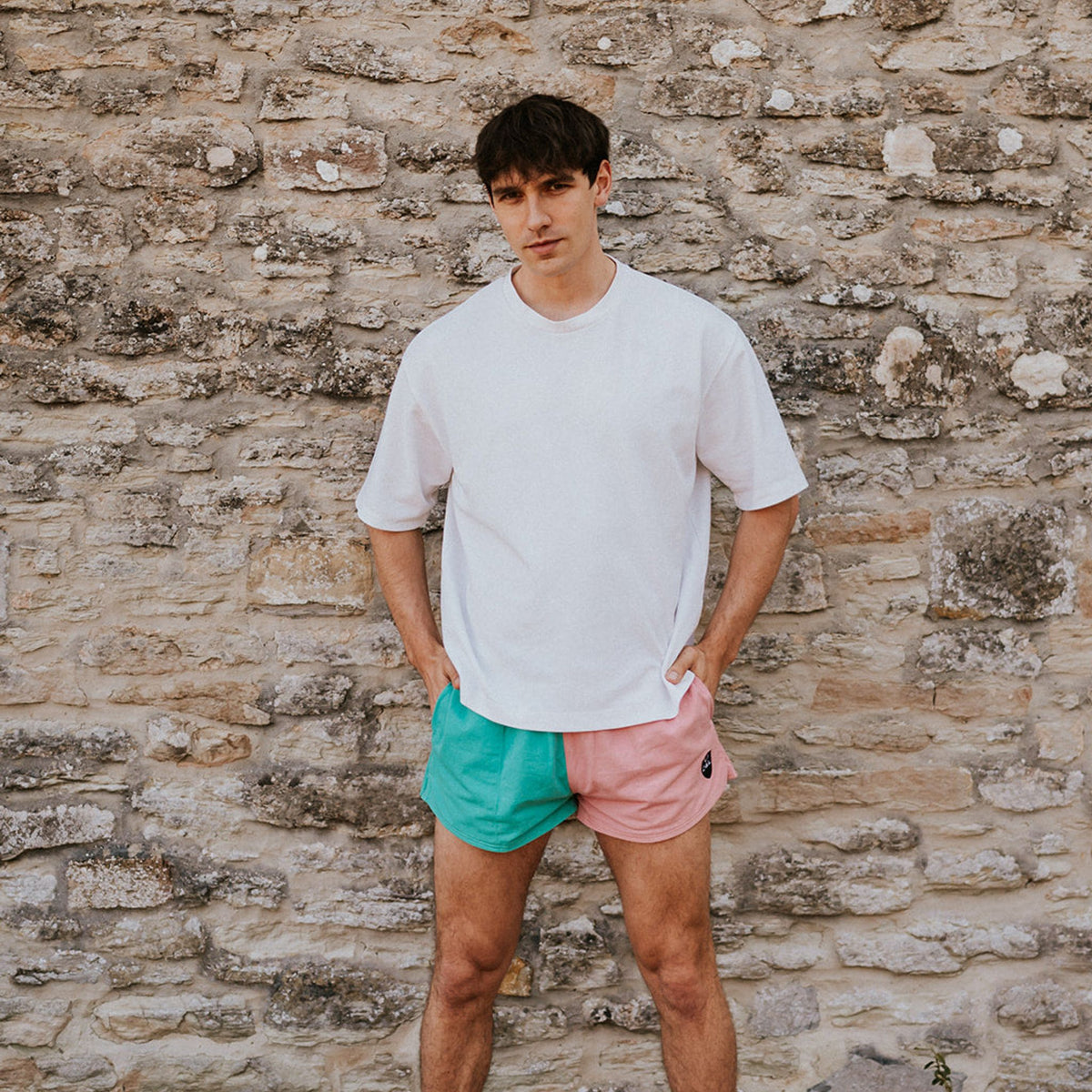 Digby &amp; Litten Coral &amp; Turquoise Rugby Shorts — shown worn.