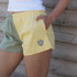 Digby & Litten Lemon & Sage Rugby Shorts — close-up detail.
